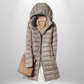 Zoey | Chaqueta larga acolchada con capucha para mujer